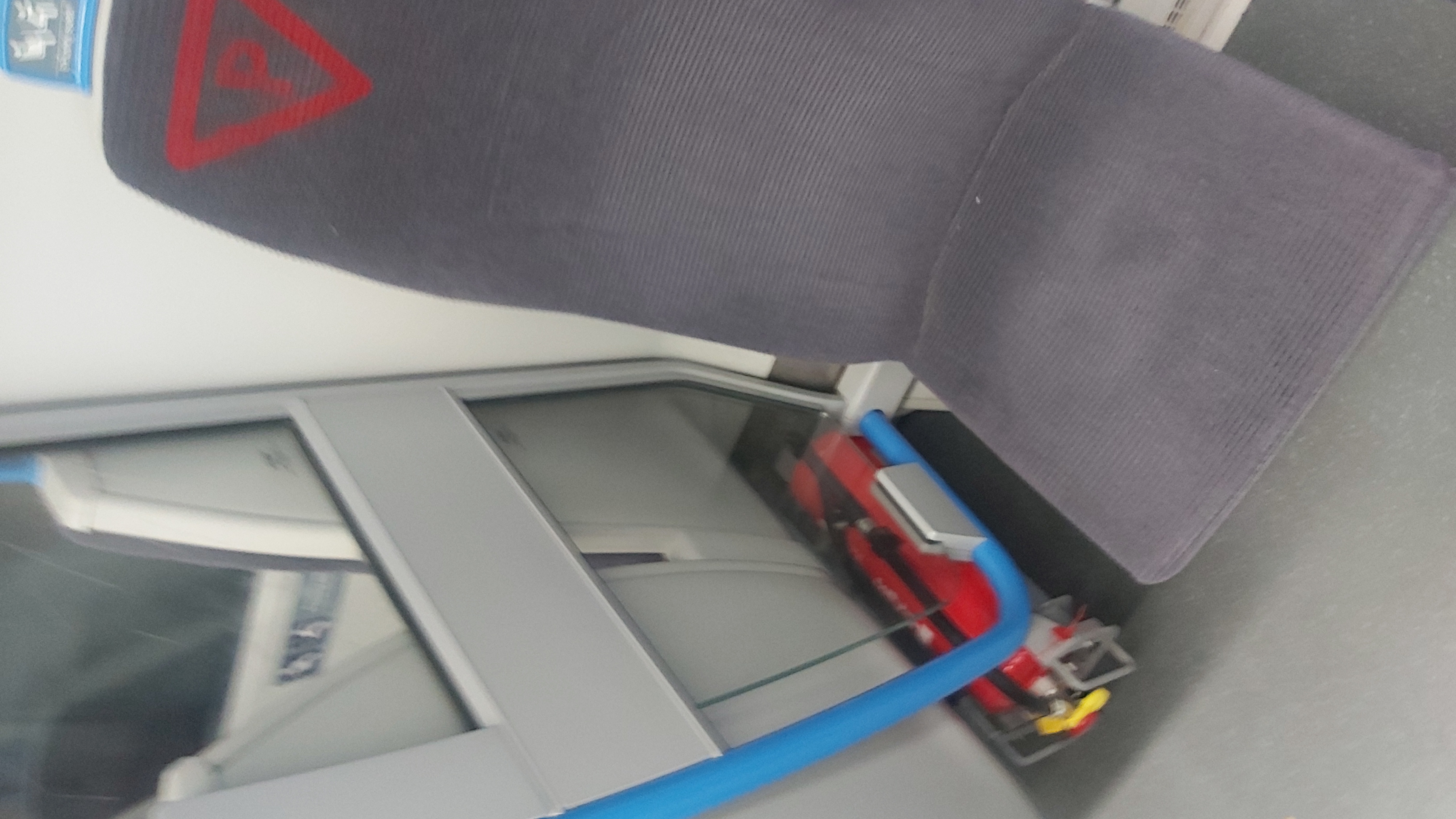 A 'cuck chair', a singular seat on a train which is set apart from the rest of the seats in the normal transverse arrangement. This one is marked
    with a red P for priority seat.